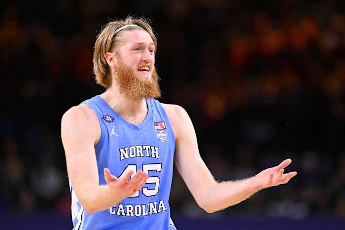 North Carolina Tar Heels forward Brady Manek (45) reacts after a play against the Kansas Jayhawks during the first half during the 2022 NCAA men's basketball tournament Final Four championship game at Caesars Superdome.